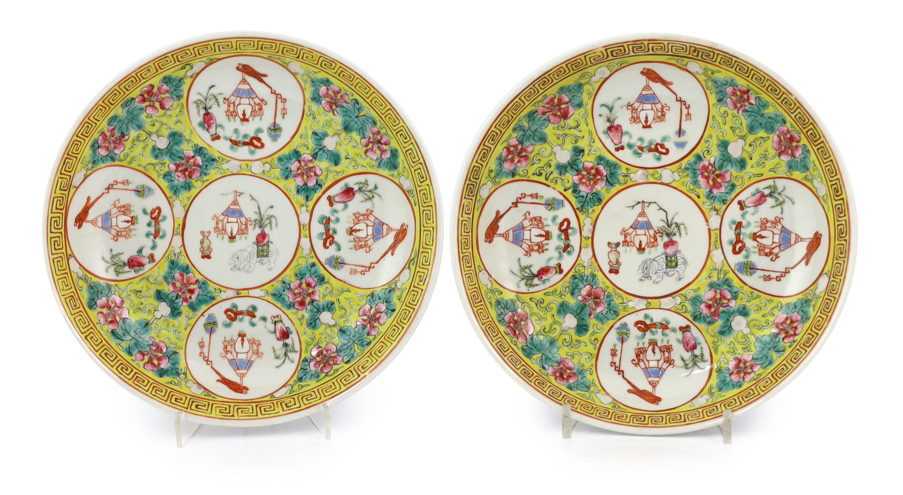 A pair of Chinese yellow ground medallion saucer dishes, Guangxu six character marks, early 20th century, hairline crack to one dish